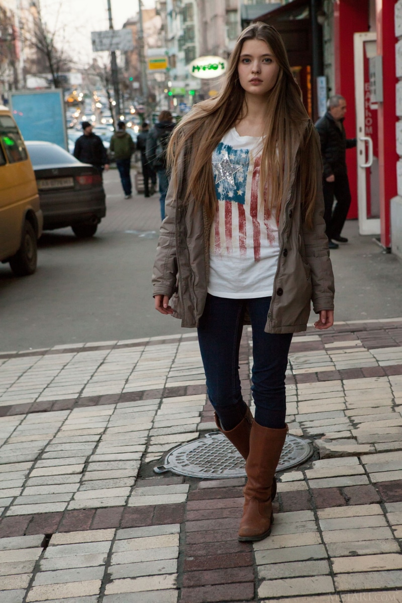 long hair, outdoors, blonde, architecture, city, young women, women outdoors, teenager, lifestyles, standing, paving stone, brown hair, one person, young adult