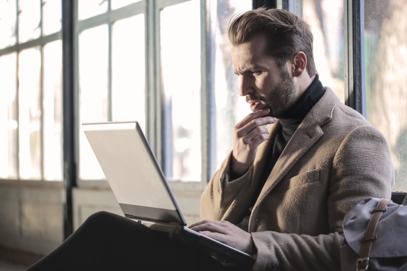 remote work, young men, indoors, wireless technology, grey, frustrated, Confused, wearing, communication, males, connection, men, using, think, contemplation
