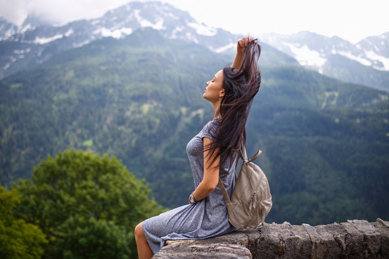 day, tranquil scene, women, casual clothing, scenics - nature, young adult, tranquility, hairstyle, lifestyles, depth of field, mountains, looking at view