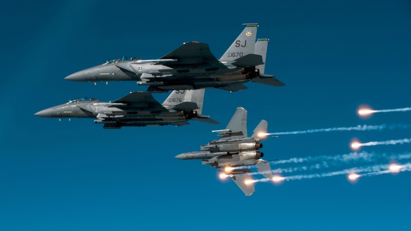 on the move, blue, aerospace industry, F-15, mode of transportation, airplane, transportation, plane, no people, outdoors, army, mid-air, flying, military