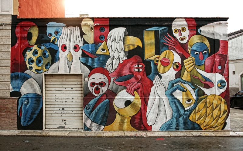 multi colored, craft, road, colors, consumerism, street art, representation, male likeness, urban, murals, female likeness, paint, mural, wood - material