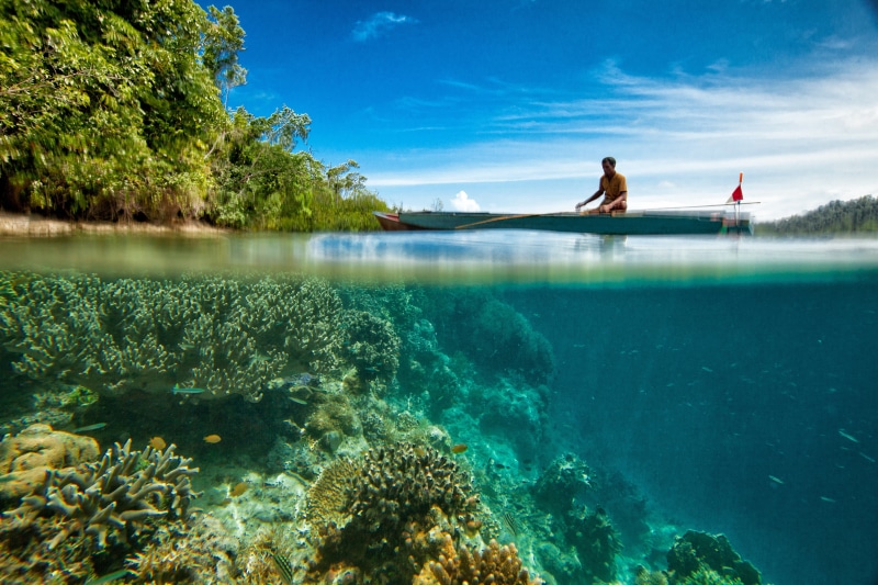 man, day, outdoors, mid adult, on the water surface, women, one person, boat, undersea, leisure activity, located on the island, body, water, landscape