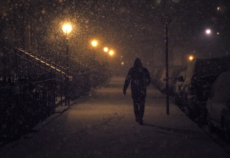illuminated, uniform, snow, men, crime, rear view, lighting equipment, mode of transportation, full length, man, one person, city, street, person, road