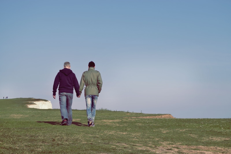 mature Adult, standing, outdoors, emotion, leisure activity, people, togetherness, walking, adults Only, rear View, caucasian Ethnicity, males, cliff, walking on