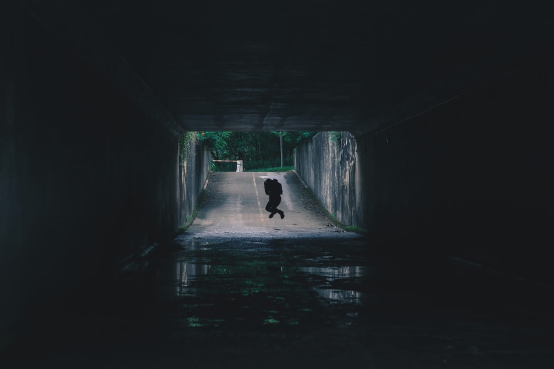 shadow, into the dark, built structure, full length, one person, day, puddle, silhouette, architecture, leisure activity, street, child, lifestyles, gray