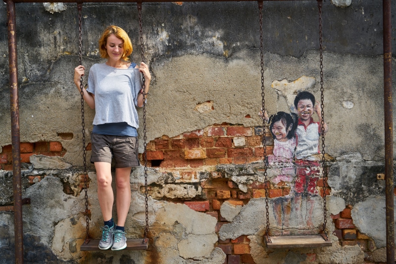 the innocence, outdoors, tourist, human, real people, day, males, young girl, built structure, scoop, smile, people, stand alone, have fun, childhood, neck