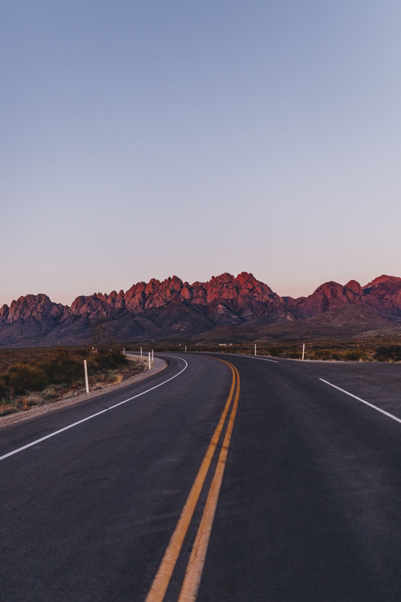 transportation, concrete, mountains, landscape, mesa, tarmac, las cruces, organ mountains, empty, symbol, sleeve, las cruces, asphalt, mountain range, beauty in nature