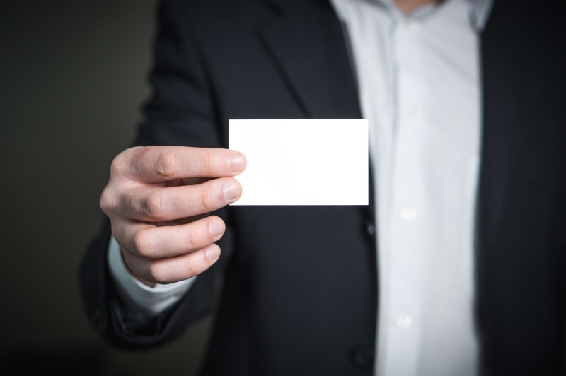 marketing, outfit, formalwear, businessman, human body part, person, formal, holding, business card, men, indoors, hold, card, business, professional, message