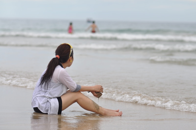 adventure, vacation, undershirt, sitting, relaxation, sport, person, white, woman on beach, coastline, water, motion, beach, day, field, seashore, one Person