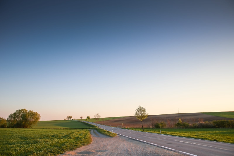 direction, no People, outdoors, land, non-Urban Scene, rural Scene, Sky, tree, country road, field, horizon, blue, transportation, plant, long, scenics