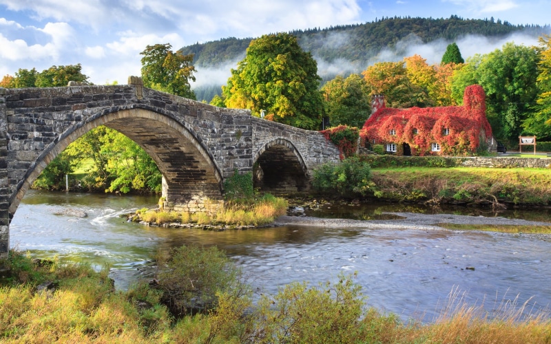 cloud - sky, UK, arch, plant, outdoors, flowing water, gray, nature, concrete, Wales, arch bridge, river, bridge - man made structure, connection, transportation
