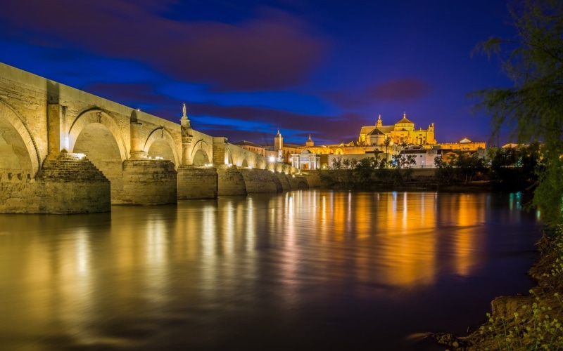 arch bridge, outdoors, the past, water, bridge, cityscape, city, cordoba, building, belief, architecture, travel destinations, river, history, reflection
