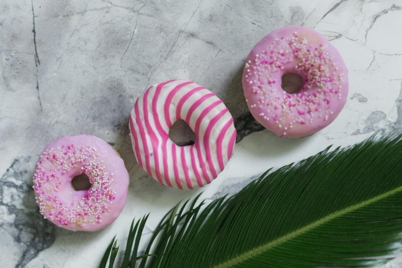 multi colored, snack, donuts, indoors, baked, colorful, delicious, icing, food and drink, temptation, purple, 5K, dessert, junk food, pink color, sweet