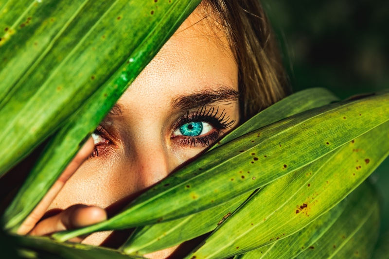 nature, color Image, green Color, leaves, women, behind, human Face, eye, green, plant part, looking At Camera, close-up, body part, palm, peeking, caucasian Ethnicity