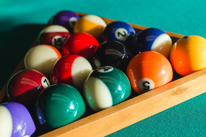 multi Colored, green Color, sport, green table, pool Table, large group of objects, order, arrangement, nobody, close-up, fun, cue, yellow, green, pool Cue