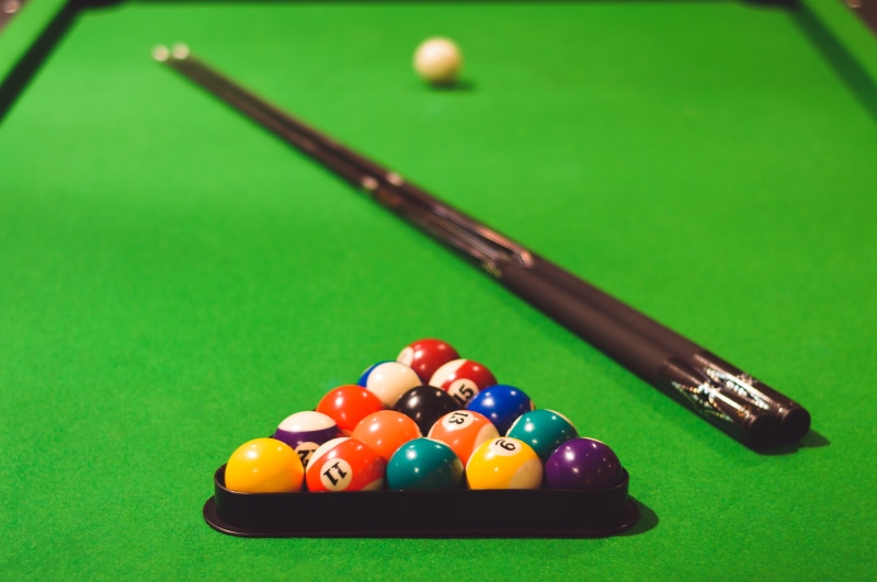 leisure games, ball, 5K, number, green color, balls, stick, triangle shape, shallow, no people, photo, billiard, pool table, cue ball, pool, focus, sport