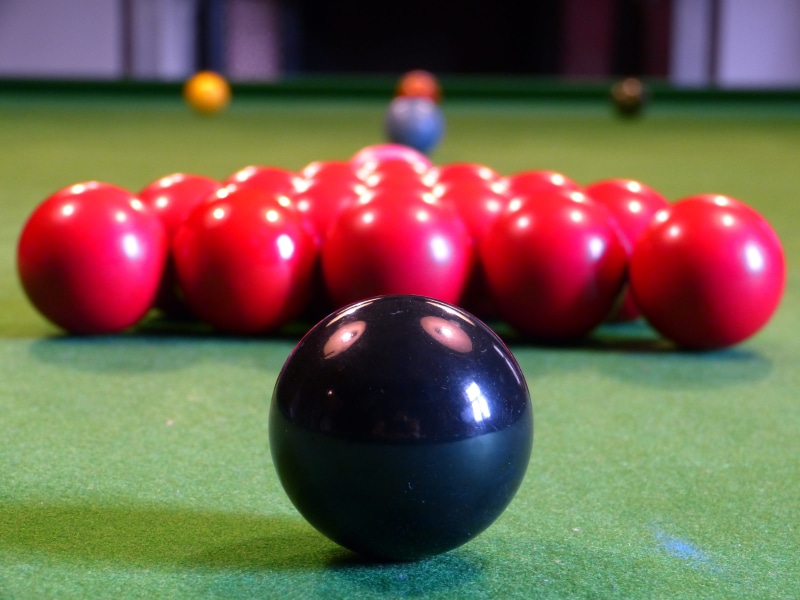 competition, close-up, ball, challenge, pool, indoors, sphere, no people, leather, black, leisure games, pool table, focus on foreground, shiny, table