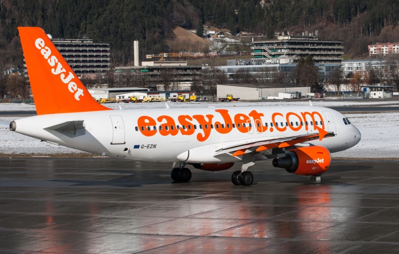 transportation, red, airliner, white, mode of transportation, plane, easyjet, aerospace industry, innsbruck, outdoors, outside, day, orange color, jet