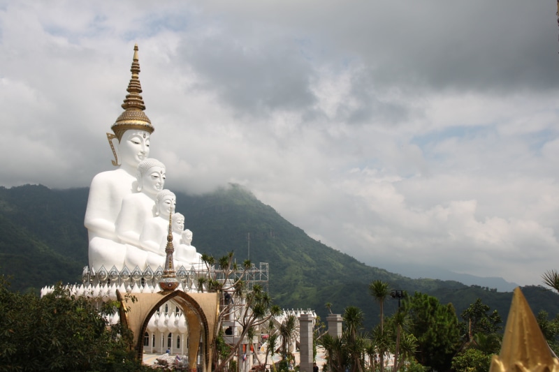 religious, cloud - sky, tourism, Mountain, spire, buddhist, monument, landmark, human representation, famous, art and craft, sky, holiday, buddhism, statue