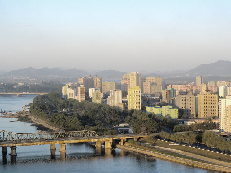 built structure, building, transportation, mountain, North Korea, waterfront, city, architecture, 2K, no people, water, bridge, sky, office building exterior