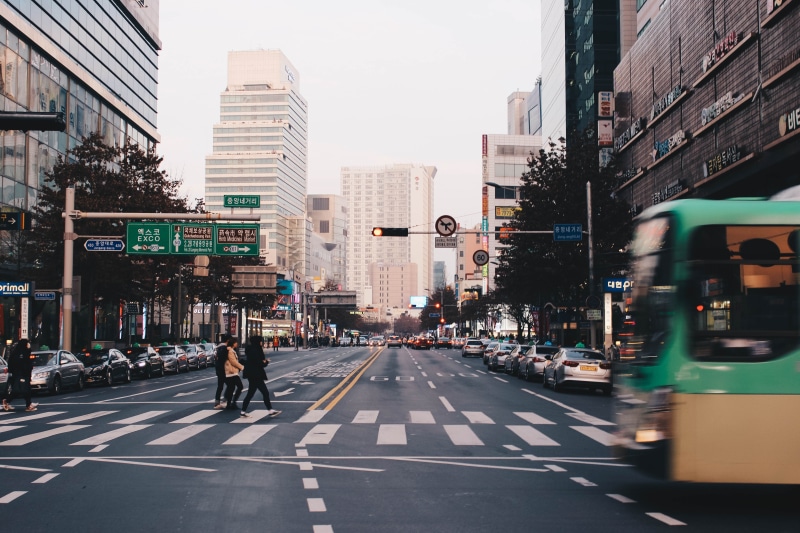 bus, the way forward, mode of transportation, sign, city, diminishing perspective, office building exterior, south korea, city street, cars, city life