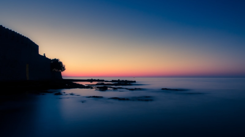 sky, tranquil scene, water, purple sky, architecture, sea, sunset, 2K, no people, idyllic, nature, copy space, outdoors, waterfront, horizon, scenics - nature