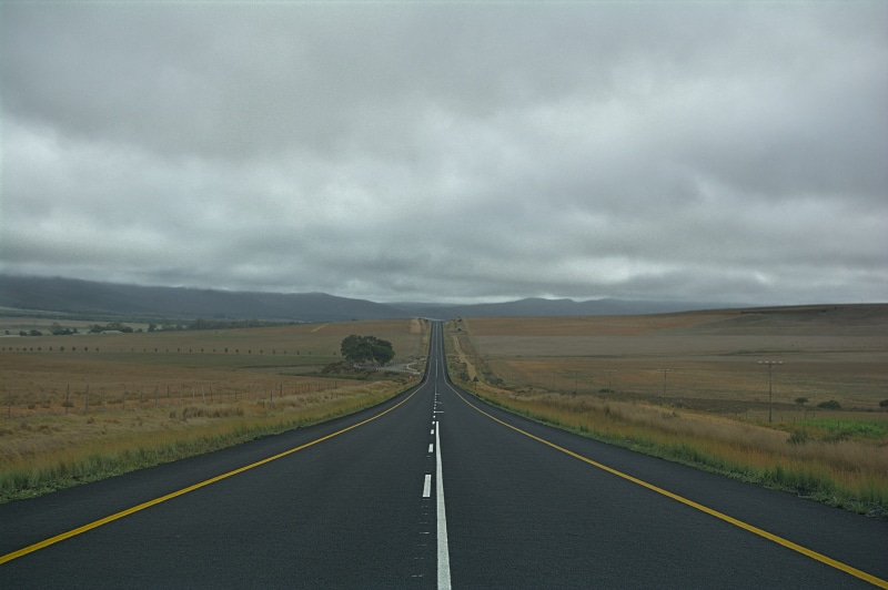 highway, marking, landscape, environment, grey, straight, symbol, no people, day, dividing line, white, direction, road, meadow, long, horizon, road marking