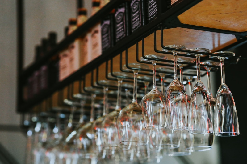 order, selective focus, drink, no people, glass, in a row, coffee, pub, metal, bar - drink establishment, table, arrangement, shelf, business, liquor, rack