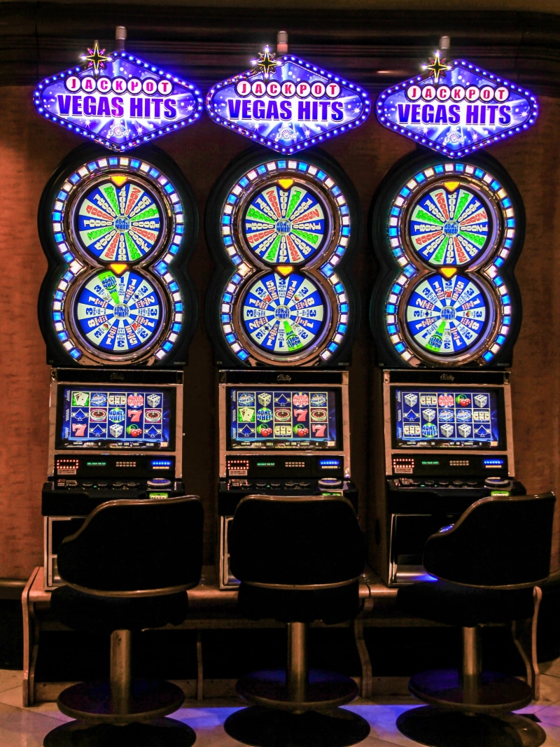 built structure, creativity, multi colored, seat, indoors, machine, glass, vegas, belief, design, play, gambling, machines, fun, jackpot, place of worship