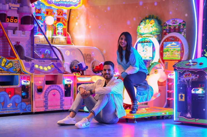 women, amusement park, slot, stage, sitting, kindergarten, front, woman, indoors, young men, inside, full length, 4K, fun, nightlife, arts culture and entertainment