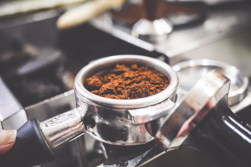 indoors, ground coffee, focus on foreground, ground, preparation, appliance, grinder, espresso, restaurant, kitchen utensil, no people, bar, selective focus