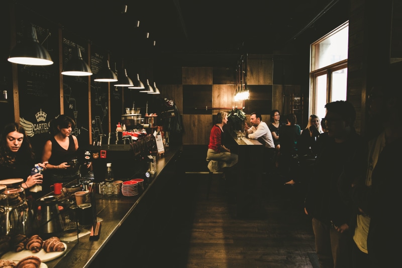 indoors, illuminated, business, dark, sitting, small business, built structure, restaurant, coffee shop, food and drink, inside, cafe, leisure activity