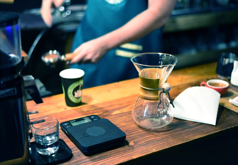 5K, refreshment, drinking glass, midsection, table, setting, human hand, Glasses, Coffee Shop, glass, Coffee, food, barista, black, adult, one person