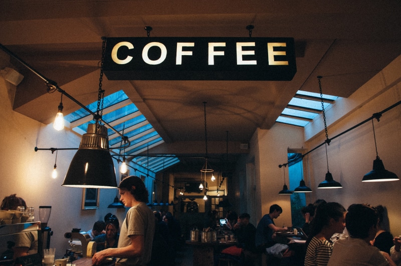 group, women, shop, cafe, room, business, coffee shop, sitting, group of people, adult, lifestyles, inside, people, communication, indoors, text, restaurant