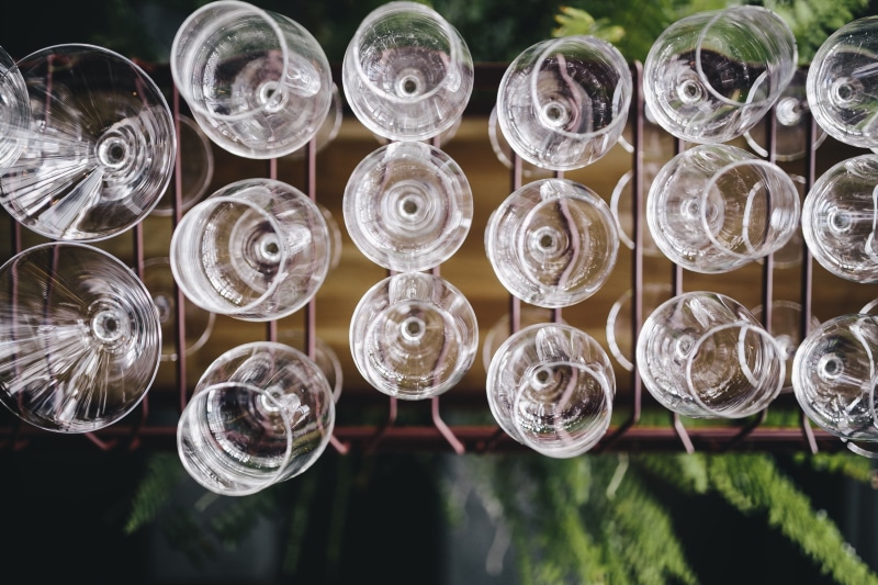 large group of objects, stack, glasses, day, no people, bunch, high angle view, glass - material, wine, wine glasses, shape, glass, focus on foreground