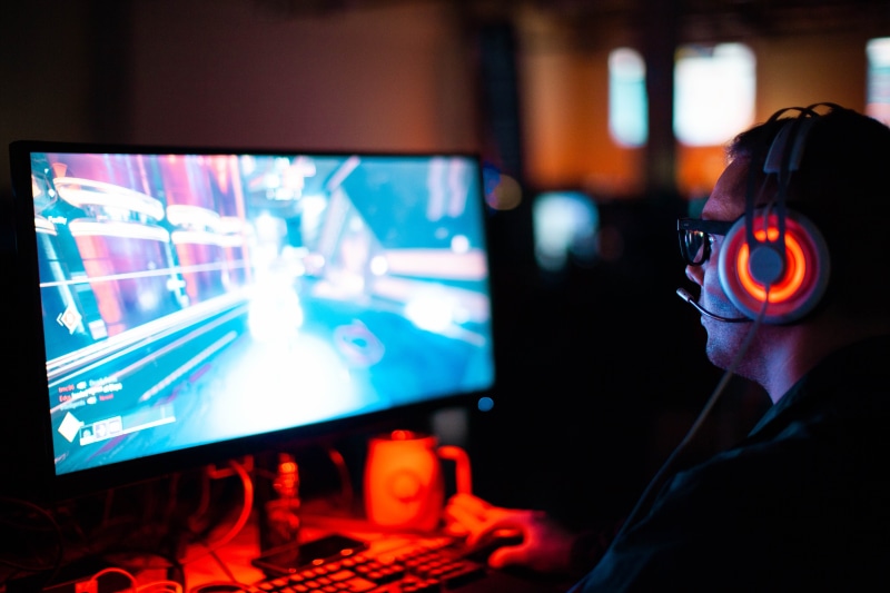fps, illuminated, one person, arts culture and entertainment, looking at screen, headset, portrait, computer, dallas, gaming, interior design, sound mixer