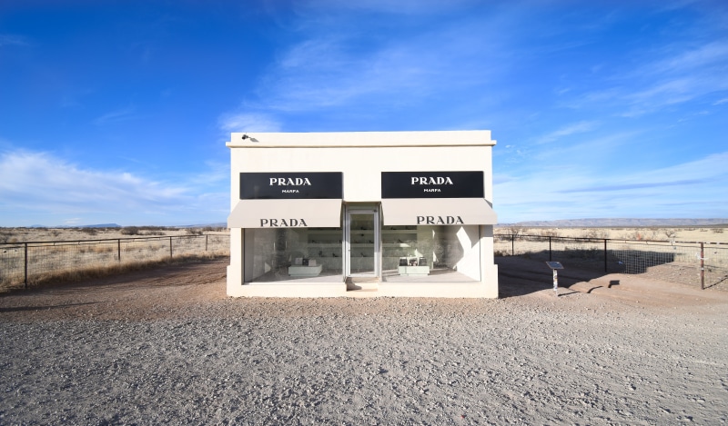 sunlight, white, day, nature, prada, sky, facade, blue, mailbox, cloud - sky, information sign, architecture, desert, built structure, road, information