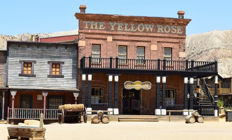 american, house, window, day, western style, sky, facade, 5K, The Yellow Rose, yellow, architecture, no people, clear sky, saloon, entrance, tourism, bar