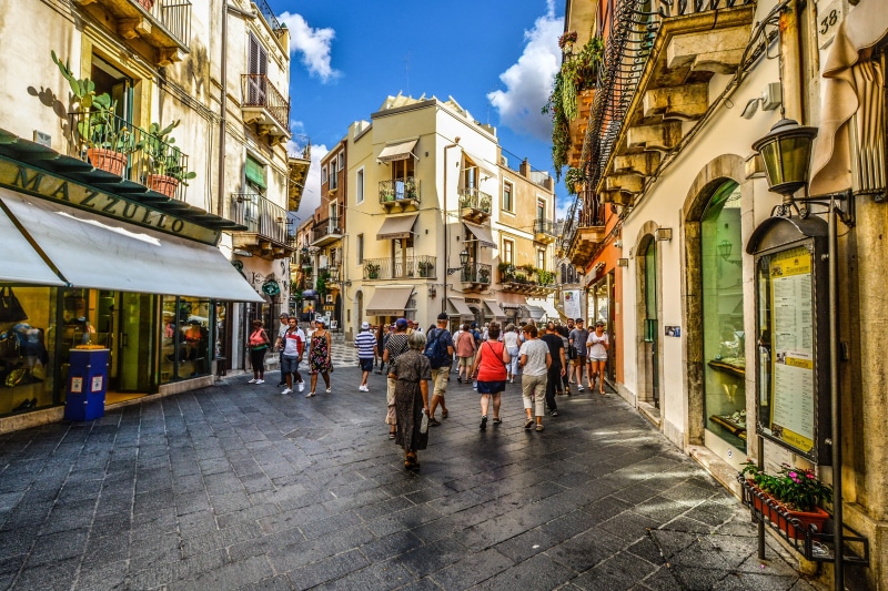 city life, town, window, building exterior, travel, sky, sicily, tourism, buildings, beside, europe, italy, women, adult, holiday, cafe, shopping, real people