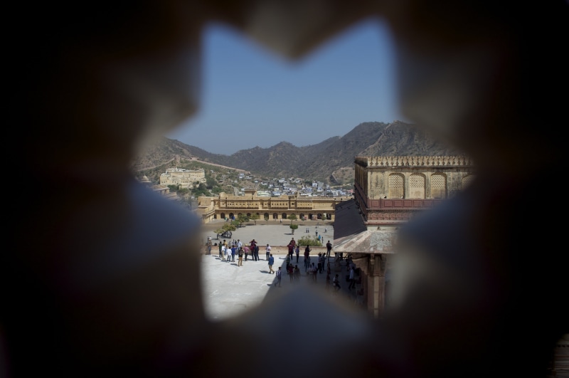 built structure, women, focus on background, outdoors, large group of people, tourism, rajasthan, fort, tourist, group of people, adult, city, mountain