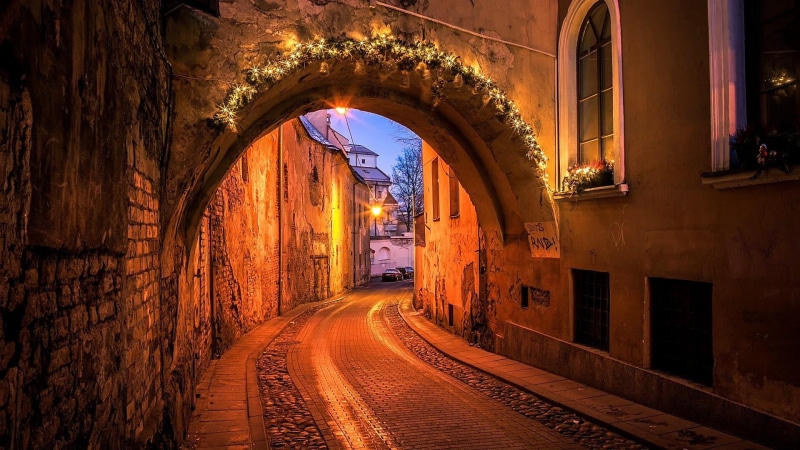 illuminated, outdoors, building, wall, tunnel, building exterior, 1080P, street, evening, direction, religion, track, medieval architecture, the way forward