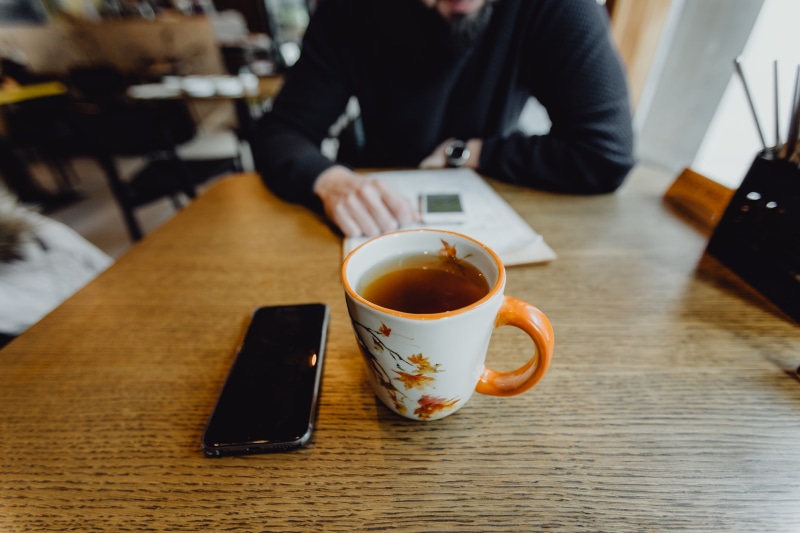 coffee cup, Ssaeu kkanpunggi, warsaw, crockery, wireless technology, table, one person, communication, koreatown, connection, technology, food and drink