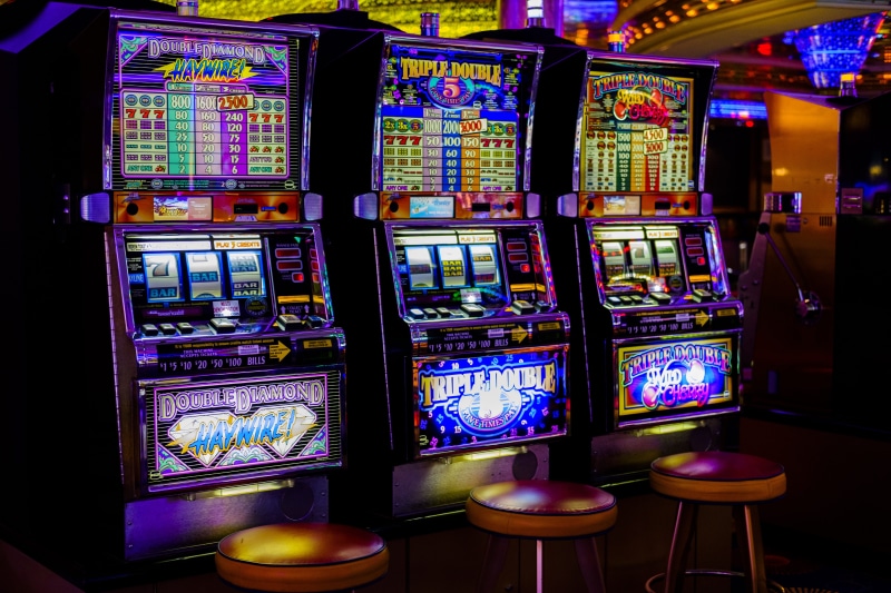 arts culture and entertainment, jackpot, luck, slot machine, choice, machines, chance, nightlife, technology, gambling, illuminated, turnover, slot machines