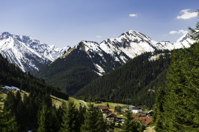 scenics - nature, sky, outdoors, explore, nature, pine tree, winter, mountain range, snowy mountain, day, tree, looking out, non-urban scene, houses, alp