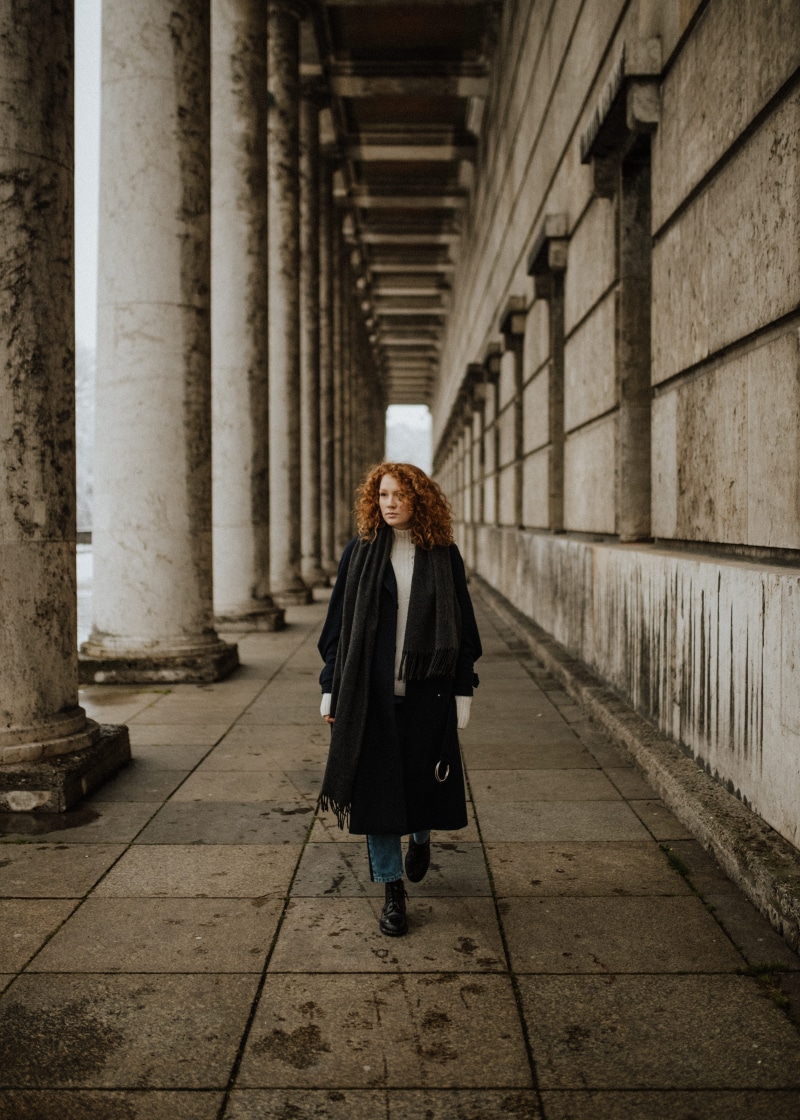 direction, adult, redhair, architectural column, portrait, corridor, curlyhair, woman, architecture, explore, casual clothing, lifestyles, built structure