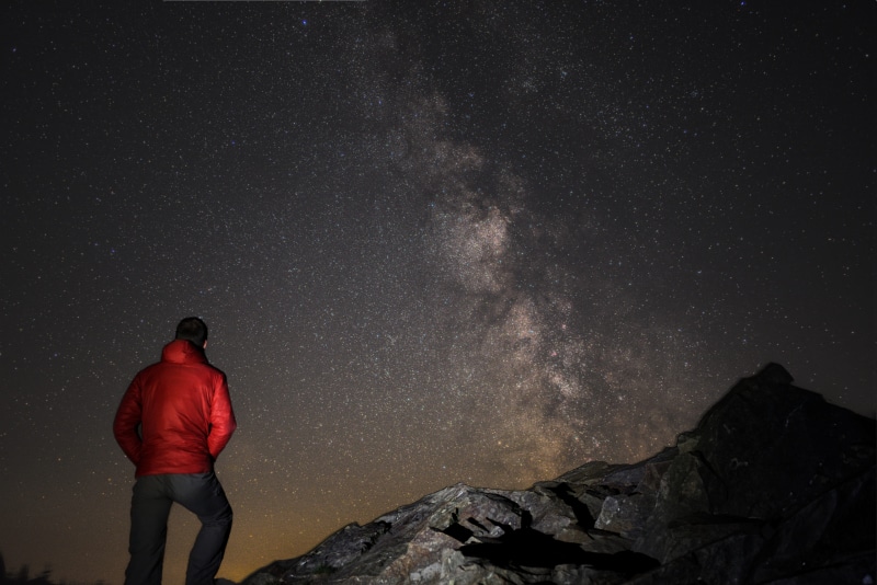 wearing, galaxy, night time, nature, jacket, explore, sky, night sky, star - Space, blue, backpack, red jacket, man, constellation, 4K, rock - Object