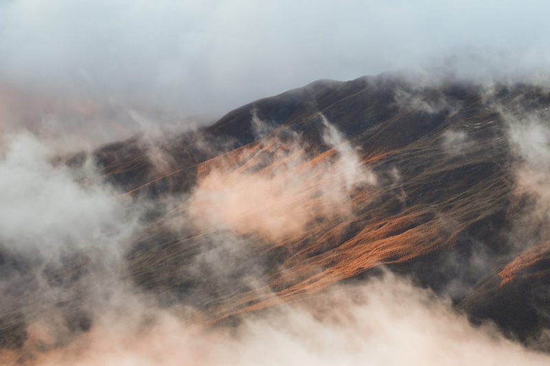 motion, non-urban scene, tranquility, explore more, heat - temperature, haze, morning, fall, mountain, scenics - nature, wind, cloudy, peak, cloud, day