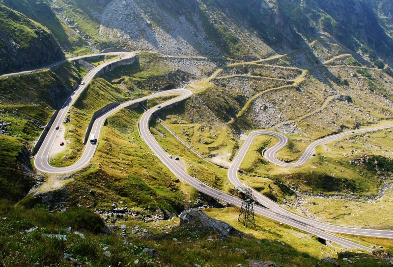 stones, transportation, highway, serpentine, landscape, no people, day, 1080P, winding road, panorama, mountains, plant, environment, aerial view, mountain road
