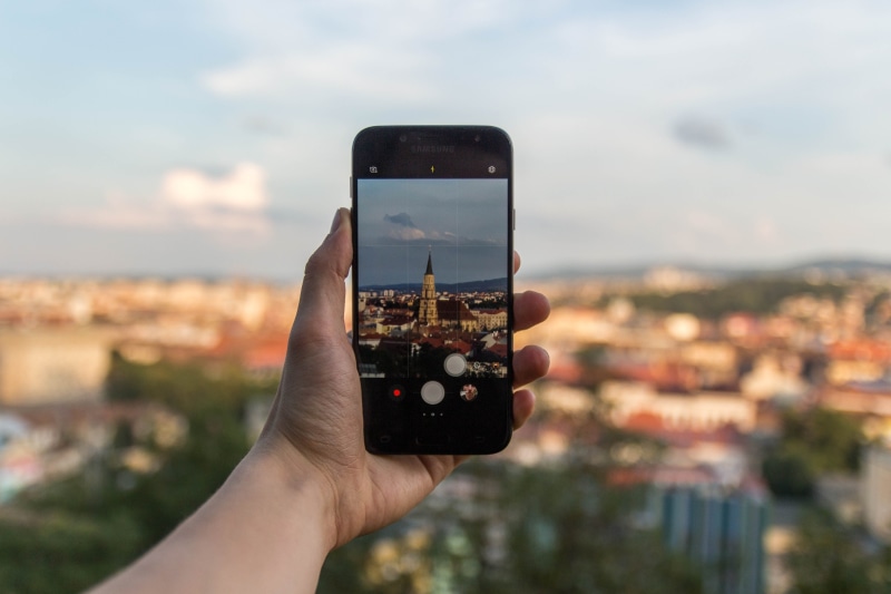 built structure, samsung, wireless technology, photography themes, city, portable information device, one person, 5K, communication, romania, building exterior