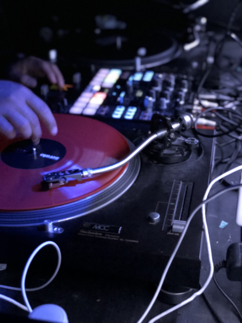 person, computer keyboard, keyboard, music, audio equipment, one person, nightclub, san francisco, video gaming, turn table, finger, human hand, indoors